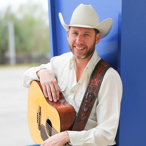 Jacob Tovar with his guitar